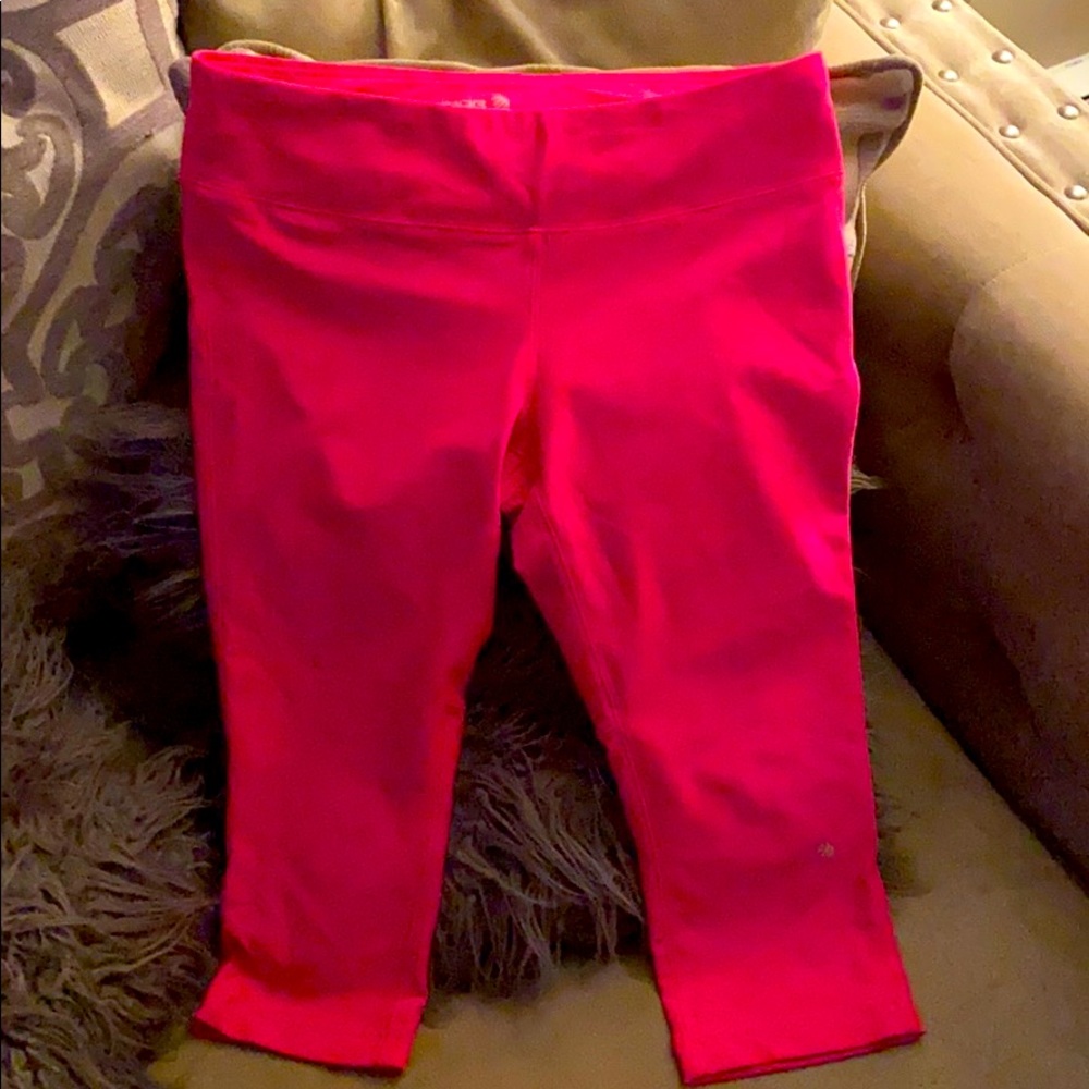Pink yoga Capri pants.